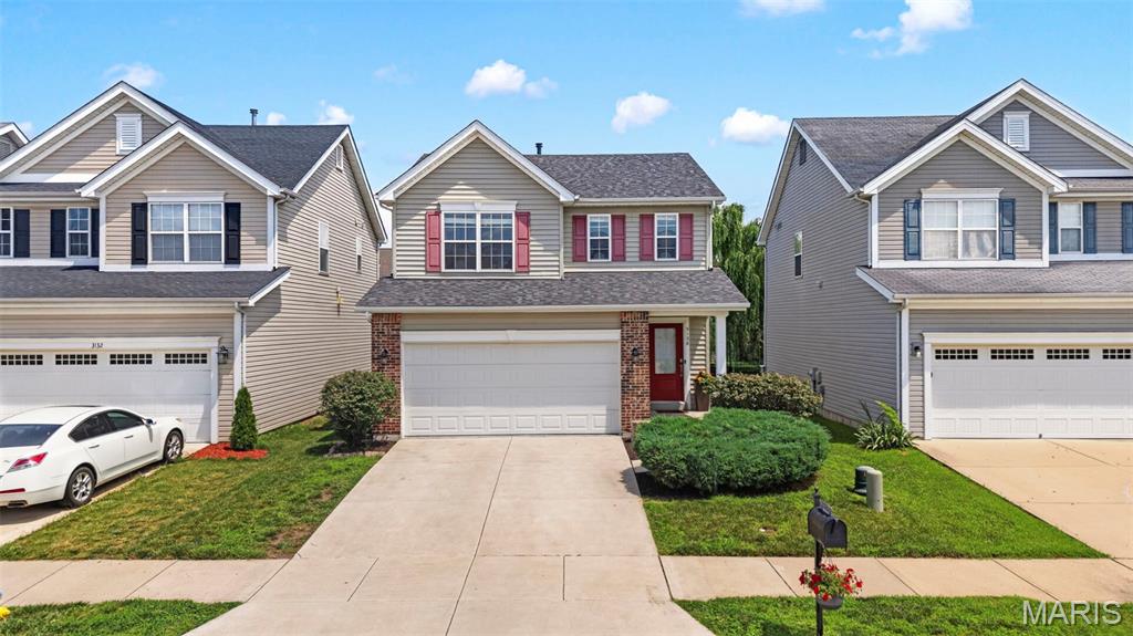 Don't miss this awesome 2 story home with hardwood floors throughout the main level, loft, full fenced back yard, new roof 2025 and 3bdrms/2.5 baths, located in Charlestowne, in the desirable Orchard Farm School District! All within walking distance of the community fishing pond, pavillion and playground! You will love the open floor plan with spacious great room, open to the dining area and kitchen, with lots of windows for so much natural light! The kitchen offers 42" cabinets w/slide out shelves, stainless appliances, including smooth top stove, tile backsplash, plus breakfast bar and pantry! Sliding glass door in the dining room leads you to a fully fenced, nicely maintained backyard with patio, perfect for your pets and to enjoy fun outside! Powder room on main level for your guests! Upper level offers new carpet (2025) and loft area, plus 3 large bedrooms, all with walk in closets and ceiling fans, including an oversized primary bedroom with ensuite private full bath. Adult height vanities in both bathrooms upstairs. Lower level offers lots of extra space for additional finished, including an egress window, if you want to add another bedroom in the future! 2 car garage. These homes go fast so don't delay! Showings start Friday July 10.