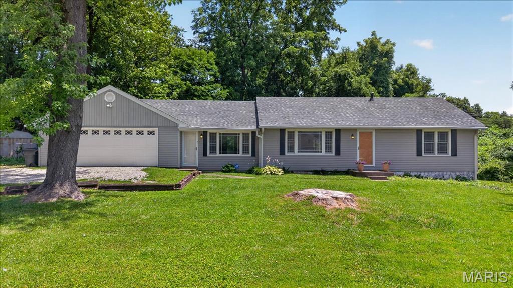 Beautiful ranch home situated on nearly an acre lot in St. Peters! This one-level home offers easy living with no interior steps. The open floor plan features a spacious living room that flows seamlessly into the updated kitchen, complete with white shaker-style cabinetry, stainless steel appliances, a gas range, and built-in microwave. Enjoy year-round views of the expansive backyard from the bright and inviting sunroom, which also includes a convenient laundry area. Three generously sized bedrooms provide plenty of space, while the mudroom offers a practical transition from the oversized garage. BRAND NEW ARCHITECTURAL ROOF. The nearly one-acre lot provides endless possibilities for outdoor entertaining, gardening, recreation, or future expansion. A rare combination of space, convenience, and updated finishes in a desirable St. Peters location!