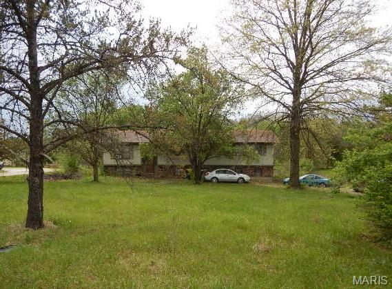 Split level with tuck side entry 2 car garage on 1.6 acres.  All information regarding features of home was based on information available in public and/or county records.  Please read the Agent Only Remarks  for details regarding the upcoming online bid event.  Do not contact occupants.