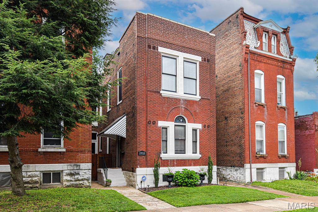 Showings begin Friday. Open House Sunday. Welcome Home! Gorgeous historic home in Benton Park! This stunning 3-bedroom 2.5 bath home has been renovated with all the right touches. The first floor features a spacious "great room" concept living room, dining room and half-bath with scratch resistant engineered flooring, the matching wood trim throughout the first floor is beautiful, including the solid wood staircase leading to the 2nd floor. The kitchen is huge and features solid countertops, lots of cabinets, island with breakfast bar, a walk-in pantry and breakfast room. A perfectly balanced space for entertaining or just relaxing at home. Kitchen has been updated with new countertops, backsplash, sink, faucet, disposal, dishwasher, refrigerator and range.
Upstairs features a large primary suite with separate tub and shower, dual sink vanity, walk-in closet and plenty of privacy from the other rooms. You will also find 2 additional large bedrooms (pained in 2024), a laundry and well-appointed hall bath. Both upstairs bathrooms as well as the main floor half-bath have been updated with new vanities, faucets, mirrors and paint. You will also love the zone HVAC system keeping each floor at the perfect temperature.  
Outside you'll love the private back yard with 6' fences, 2 parking pads and beautiful tree-lined street. A new roof was installed in 2024 and the building has been tuckpointed recently.  The location can't be beat!  Just a short walk to Benton Park and Cherokee Park, plus all the shopping, dining and nightlife the Benton Park neighborhood is known for.  
Hurry before it's gone.