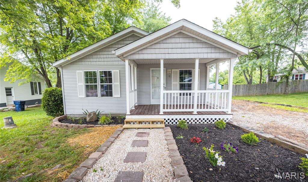 Completely remodeled and move-in ready, this beautifully updated 4-bedroom, 2-bath home in the heart of Salem offers the perfect blend of modern style and everyday comfort. From the moment you arrive, the welcoming covered front porch invites you to slow down, relax, and picture yourself at home. Inside, you’ll immediately notice the fresh, bright feel created by new paint and luxury vinyl plank flooring throughout the entire home. The open-concept kitchen and dining area was designed with both functionality and connection in mind, creating the perfect space for gathering with family, hosting friends, or simply enjoying daily life. The modern finishes and updated layout give the home a clean, contemporary feel while still maintaining a warm and inviting atmosphere. With four bedrooms and two updated bathrooms, there’s room for everyone to spread out comfortably. Whether you’re searching for your first home, upgrading for more space, or simply looking for a property where all the hard work has already been done, this home checks all the boxes. Conveniently located in Salem, you’ll enjoy small-town charm while being close to local shopping, dining, schools, and outdoor recreation. Homes this updated and move-in ready don’t come along often—schedule your private showing today and see everything this beautiful property has to offer!