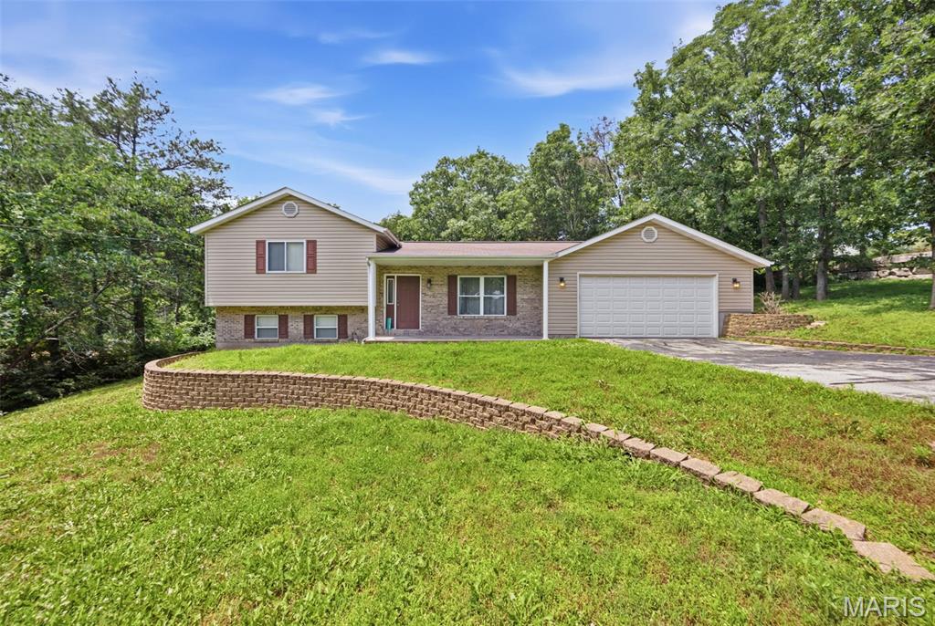 Is there a 3-bed/3-bath home in Lake Forest Estates under $300,000 that offers multiple living areas, lake community amenities, and a convenient location? Welcome to 12105 Cedar Circle Dr in the desirable Lake Forest Estates community. Built in 2001, this well-maintained tri-level home offers approximately 1,600 square feet of total living space, including about 1,200 square feet above grade, with 3 bedrooms and 3 bathrooms designed for comfortable everyday living.

The versatile floor plan features two separate living areas, providing flexibility. Recent improvements include updated flooring and a roof that is approximately six years old, offering added value and peace of mind.

The attached 2-car garage provides convenient parking and extra storage, while the back deck offers a private setting for outdoor dining, gatherings, or simply enjoying the peaceful surroundings. You'll appreciate the convenience of being located near the entrance of Lake Forest Estates, allowing for easy access in and out of the community.

Residents enjoy access to three community lakes, creating endless opportunities for fishing, boating, kayaking, and outdoor recreation. Even better, the community swimming pool, basketball courts, and pickleball courts are located directly across the street, making it easy to take advantage of the neighborhood's outstanding amenities.

Whether you're looking for a full-time residence or simply want to enjoy the lifestyle that comes with lake community living, this home offers comfort, convenience, and recreation at an attractive price point. Schedule your showing today!