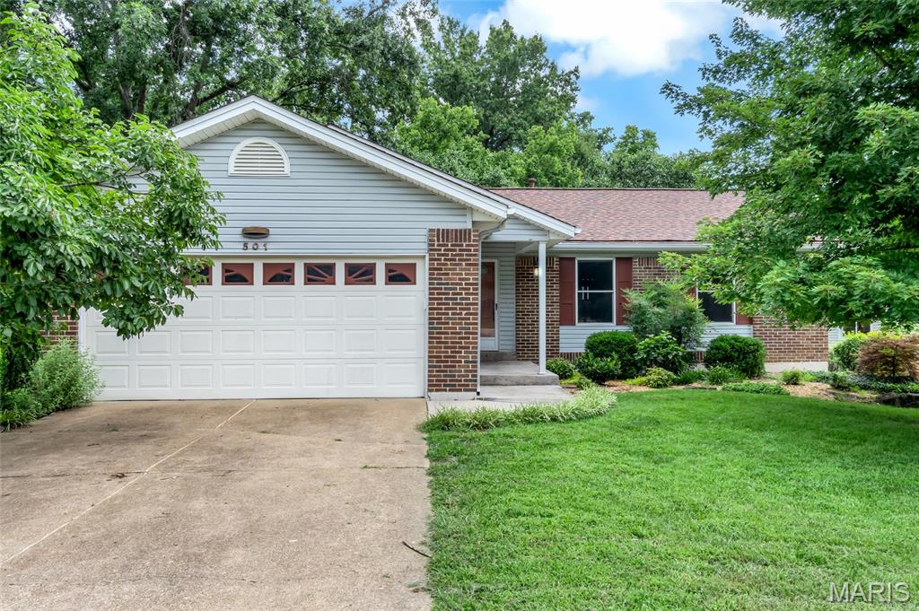 Located in a beautiful neighborhood, this home has a large deck and backs to woods. You will feel like you are in a wooded retreat. Updated flooring in the living, dining and kitchen makes this home feel warm and inviting. 
The main level features a large dining room, living room with brick fireplace, view of the woods, updated kitchen, 2 bedrooms and 2 bathrooms. The lower level offers a large rec room, sliding door walk out, full bathroom and a bonus room that can be used for a home office or extra sleeping space. 
With a little bit of paint and personalized touches this could be the home of your dreams.