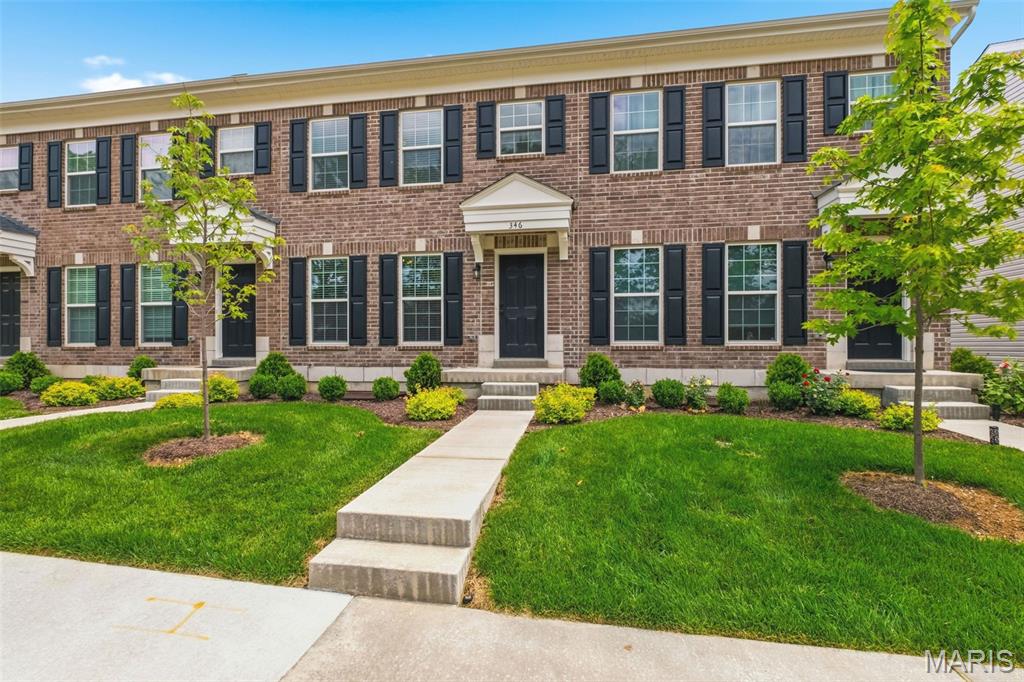 UPGRADE YOUR LIFESTYLE! Modern, Low-Maintenance Living in the Heart of O’Fallon

Step into a lifestyle that blends comfort, convenience, and community in this beautifully designed 2-bedroom, 2.5-bath townhome by McBride Homes. Located in the highly desirable Harvest Townhomes community, this move-in-ready home is ideal for busy professionals, first-time buyers, or anyone looking to enjoy stylish living without the maintenance headaches.

The popular Georgetown floor plan welcomes you with an inviting front porch and a bright, open-concept layout filled with natural light. Wide-plank luxury vinyl flooring, oversized windows, and contemporary finishes create a warm yet modern feel throughout the main level.

The spacious living area flows effortlessly into a designer-inspired kitchen featuring Silestone countertops and backsplash, stainless steel appliances, 42” cabinetry, a breakfast bar, and plenty of storage — perfect for casual nights in or entertaining friends and family.

Upstairs, the private primary suite offers walk-in closets and a spa-like ensuite bath with custom porcelain tile flooring. A generously sized second bedroom, with the same porcelain tile flooring, full hall bath, and convenient upstairs laundry, provides flexibility for guests, a home office, or roommate living.

The popular Georgetown floor plan welcomes you with an inviting front porch and a bright, open-concept layout filled with natural light. Wide-plank luxury vinyl flooring, oversized windows, and contemporary finishes create a warm yet modern feel throughout the main level.

Forget spending weekends mowing grass or shoveling snow — exterior maintenance is handled for you, giving you more time to travel, socialize, work out, or simply relax.

Life at Harvest goes far beyond your front door. Residents enjoy access to exceptional community amenities, including a 13-acre town square and civic lawn, pickleball and bocce courts, walking trails, food truck gatherings, community gardens, orchards and pumpkin patch, splash pads, playgrounds, and nature-inspired gathering spaces designed to bring neighbors together.

Conveniently located near Highways 364, I-64, I-70, shopping, restaurants, and entertainment, this home offers the perfect balance of suburban comfort and modern accessibility.

At Harvest, you’re not just buying a townhome — you’re upgrading your lifestyle.