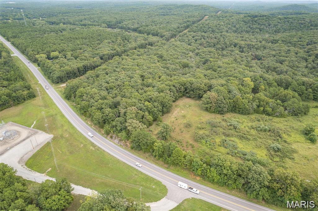 Build your dream home in the Farmington area now.   Located just 6 miles from Farmington on Hwy 32.  Make this choice your best with zero restrictions on 3.14 raw acres of undeveloped land.  New survey will be uploaded soon.