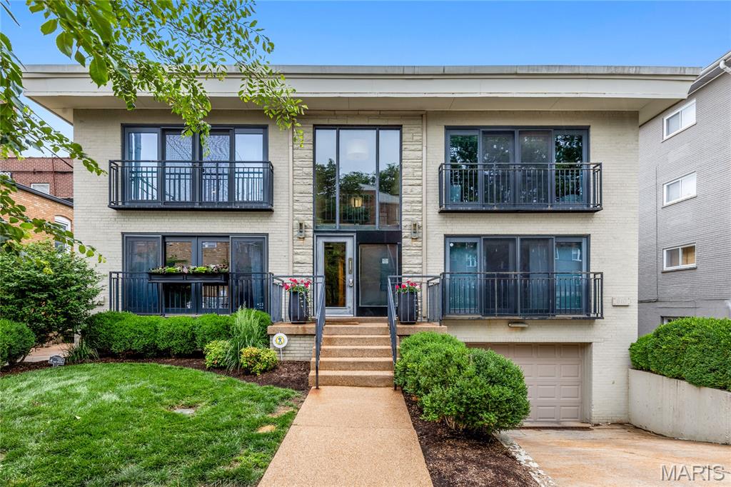 Experience elevated living in the heart of Clayton with this sophisticated designer condo, where luxury, convenience, and style converge. Perfectly positioned within walking distance to award-winning dining, upscale boutiques, and vibrant city life, this exceptional 2-bedroom, 2-bath residence offers the ultimate urban lifestyle. Bathed in natural light, the thoughtfully designed open floor plan showcases rich wood flooring, sleek stainless steel appliances, a stylish breakfast bar, and seamless flow ideal for both everyday living and entertaining. Every detail has been curated to create a warm yet refined atmosphere. The expansive primary suite serves as a private retreat, complete with a spa-inspired en-suite bath and generous closet space. Additional highlights include in-unit laundry, a coveted underground parking space, and the peace of mind of a secure building. Located in the prestigious Clayton School District and just moments from Washington University, this residence offers an unparalleled combination of elegance, comfort, and premier location — an extraordinary opportunity to enjoy the very best of Clayton living.