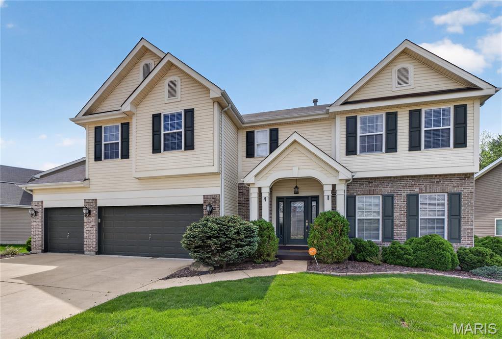 Spacious two-story home that blends comfort with modern updates and plenty of room to spread out.  As you walk in, you're greeted by a bright open foyer with archways that flows into the main living & formal dining area.  The home has four generously sized bedrooms with four bathrooms, giving everyone their own space without feeling crowded.  The main level also features a family area with woodburning fireplace & bay window.  Kitchen is updated, newer countertops, a large island with electric smooth cooktop, built in microwave/oven, walk in pantry, some stainless-steel appliances, wine cooler, & plenty of cabinetry.  Breakfast area leads to large deck extending off back with plenty of privacy for gatherings.  Built in gazebo adds a relaxing touch to unwind at the end of the day.  Upstairs you will find a large loft/additional family area with vaulted ceilings, & laundry room.  Master bedroom suite with separate tub and shower (new door), his/her sinks, ceramic tile flooring, & walk in closet organizer.  Downstairs, the finished basement expands your living options even further.  It includes a dedicated office space with French doors, perfect for working home, along with an additional family area for entertaining including wet bar, & lower-level full bath.  The three car garage offers epoxy floors, ample storage and parking.  Many upgrades to enjoy, new painting throughout, light fixtures, ceiling fans, wired for surround sound, lawn irrigation system and more.  Call today for a private tour!