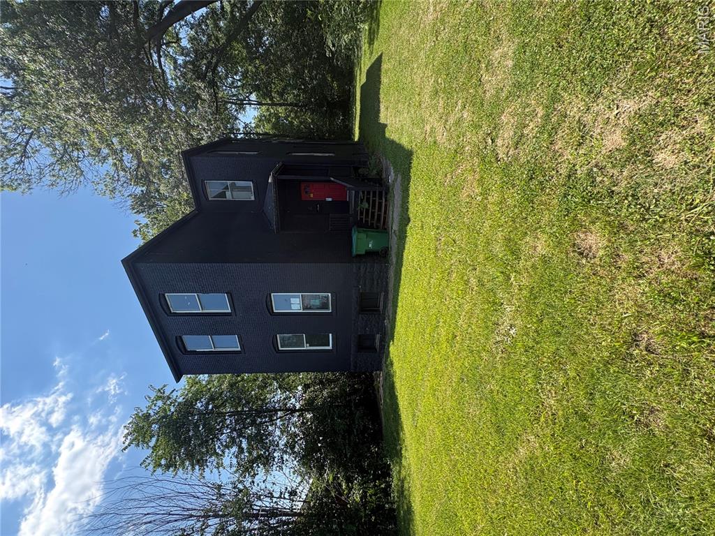 OUTSTANDING OPPORTUNITY!!! This Normandy 2-story is sure to please!   SO much work done here!  Newer windows, deck & MORE!  Fashionable black paint, brickwork, offstreet parking and HUGE rooms make this one a WINNER! Schedule a showing today! Property is to be sold in its current as-is condition with no warranties or representations by the Seller. Seller will not make repairs nor provide any inspections. Seller's addendum is required after terms of sale are agreed upon. Special Sale Contract (Form #2043) required. Proof of funds or pre-approval letter required with offer.