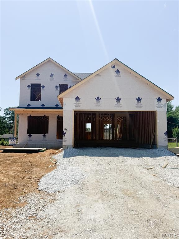Under Construction on Lot 4 of John Street. Located within walking distance of schools, restaurants and shopping. Beautiful brand-new two-story home offering 3 bedrooms, 2.5 baths, and 1,632 sq ft of thoughtfully designed living space. This modern build features an open-concept main level with a bright living area, stylish kitchen finishes with shaker cabinets, Granite counters, eat-in island and a convenient guest bath. Iron spindles and upgraded wood banister leading to upstairs. Upstairs, includes a spacious primary suite with its own full bath with dual sink vanity and large walk-in closet.  Two additional bedrooms, and a second full bath also upstairs. All Plumbing Fixtures, Door Hardware and light fixtures have been upgraded to a Black Finish. Two Panel doors and tilt-in windows throughout. Downstairs you will find an open canvas with a full rough-in bath, sump pump and egress window for future finish. Exterior includes upgraded architectural shingles, Vertical Board and Baton Siding with Sill High Stone and craftsman style columns. Estimated to be completed mid-August. Display home of this model available to walk through. Finishes will vary from photos. Photos of previous build of same model.