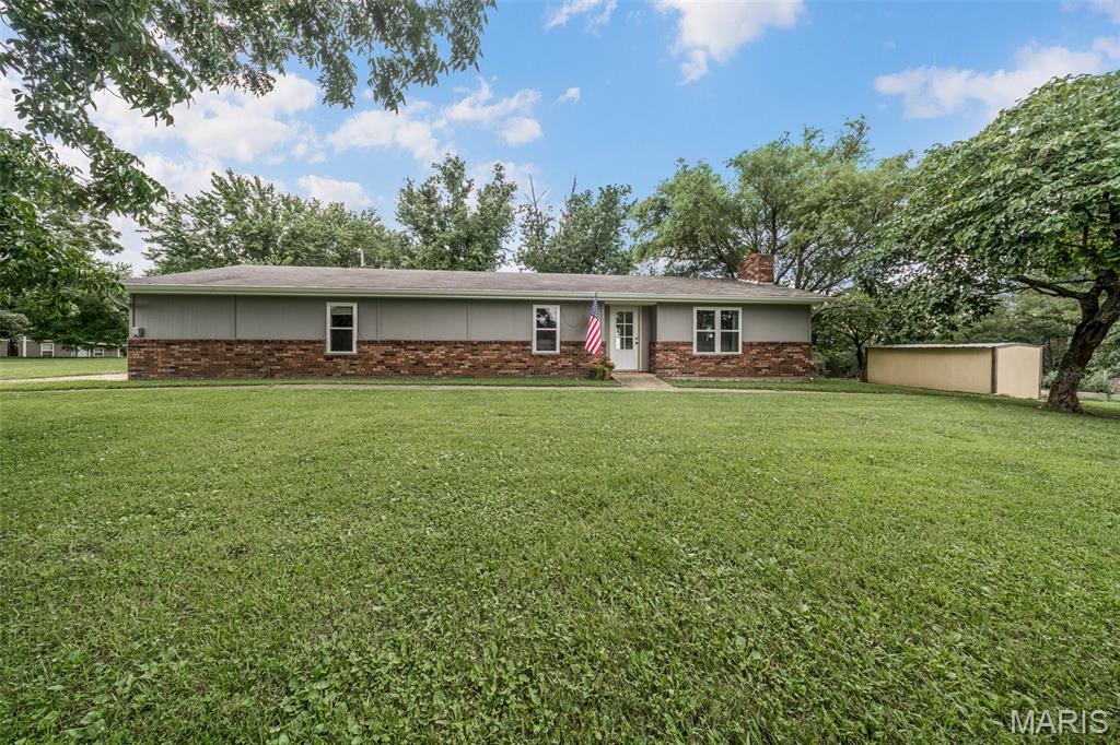 Escape to the peace and beauty of the countryside with this beautifully renovated 3-bedroom, 1-bath home situated on 70.90 acres m/l conveniently located between Rolla, Salem, and Licking! Renovated in 2022–2023, this approximately 1,612 sq. ft. home blends modern updates with timeless farmhouse charm. The open-concept layout is enhanced by shiplap accents throughout, creating a warm and inviting atmosphere. The spacious kitchen is a true standout, featuring butcher block countertops, a pantry, double ovens, stainless steel refrigerator, custom cabinetry, and charming antique sink and stove that add unique character. The updated bathroom offers dual vanities and a tub/shower combination, while major improvements including new windows, doors, HVAC, and most appliances provide peace of mind.  Step outside to discover a property that's ready for your farming or homesteading dreams. Approximately 60% of the acreage is open pasture, complete with a barbed wire perimeter fence, 3–4 strand electric cross fencing. Chicken coop, garden beds, a goat enclosure, a permanent corral system, and a run-in shed all convey with the property!  Portable corral panels & pens are not included. A valuable bonus awaits at the back of the property with a ready-to-build site featuring a 30x40 concrete footing, new well and pump, and full electric service already established. This added infrastructure, valued at approximately $35,000, provides a great head start for your future build or additional improvements. Whether you're looking for a hobby farm, livestock operation, or simply a private country retreat, this exceptional property offers endless possibilities. Spectacular views, breathtaking sunsets, abundant wildlife, modern comforts, and usable acreage make this one a must-see—schedule your private tour today!