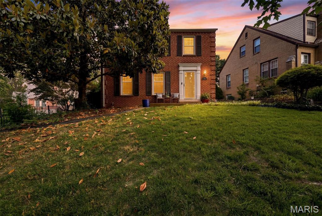 Est. 1941 Nestled into a friendly, storybook, walkable neighborhood known for its charm and community feel, this classic brick Colonial is the kind of home that never goes out of style. With its stately symmetry, mature landscaping, and classic architectural lines, the home exudes the kind of curb appeal that feels both elegant and effortlessly welcoming. When you step inside, the gracious living room perfectly captures the timeless character and warmth found throughout the home, anchored by a wood-burning fireplace, stained glass, and custom built-ins that add sophistication and functionality. The space feels both refined and inviting, with rich hardwood floors throughout, lots of natural light, and a beautiful architectural flow into the surrounding rooms. Open sight-lines and warm finishes make the dining room, breakfast bar, and kitchen with custom cabinetry feel connected, welcoming, and comfortable for casual moments and hosting memorable parties. What more could you ask for? How about a vaulted great room off the kitchen with wood-beam ceilings, a striking stone mantel and gas fireplace with backyard views to create a space that feels like a cozy retreat - this home is comfort and character! You haven't even made it upstairs where you'll find 3 great-sized bedrooms, all hardwood, including a peaceful primary surrounded by Magnolia views and a spacious refinished full bathroom. This home offers the charm and craftsmanship buyers crave, paired with the easy livability and a fantastic location! You’re just minutes from downtown Clayton, Brentwood, and Maplewood with amazing restaurants, shopping, and everything else you love, like Forest Park! Classic. Inviting. Effortlessly stylish. This is the kind of home people wait for in a neighborhood you hope for!