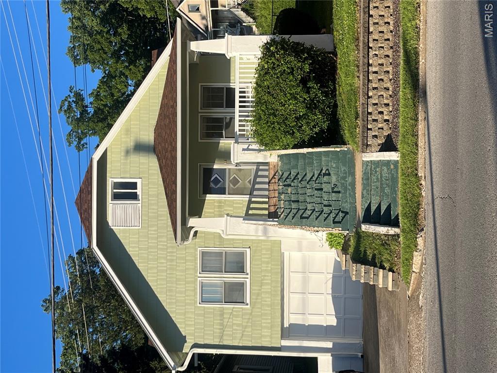 This charming home offers many updated features. Fresh coat of paint on the exterior, new wiring throughout the house, new chimney liner and new laminate flooring in the kitchen and one bedroom, all completed in 2026.  The roof was replaced in the fall of 2023 as well as the guttering and downspouts. The hot water heater was new in 2025 and the bathroom was completely updated six years ago. The attic has all new sheet rock and provides plenty of extra storage. The retaining walls in front were completely redone 3 years ago as well as the decking boards on the front porch.This home conveniently sits in the middle of town close to schools, shopping and restaurants.  This could be a great starter home or could be an addition to your investment portfolio. Don't miss the opportunity to see this home! Please call for an appointment today!