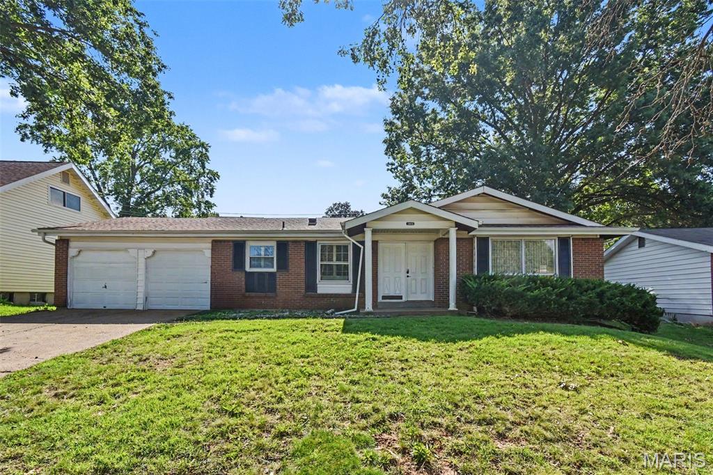 Welcome to this beautifully appointed four-bedroom, two-and-a-half-bathroom home located in the desirable Whitney Chase neighborhood.

This East-facing residence features a bright and spacious open floor plan, highlighted by elegant hardwood and tile flooring that creates a seamless flow throughout the main level. The updated kitchen serves as the heart of the home, boasting solid surface countertops and stainless steel appliances to the living areas for easy entertaining and daily living. Downstairs, the fully finished basement offers fantastic bonus space that can be adapted to fit your lifestyle.

The home includes a primary suite with its own dedicated private bathroom. Step outside to enjoy a fully fenced backyard that provides a secure, private retreat for outdoor activities. Complete with a two-car garage, this property offers plenty of space and functionality.

The location is a standout feature, providing easy access to local shopping, dining, and major highways, making for a convenient daily commute and effortless weekend outings.

Schedule your private showing today!