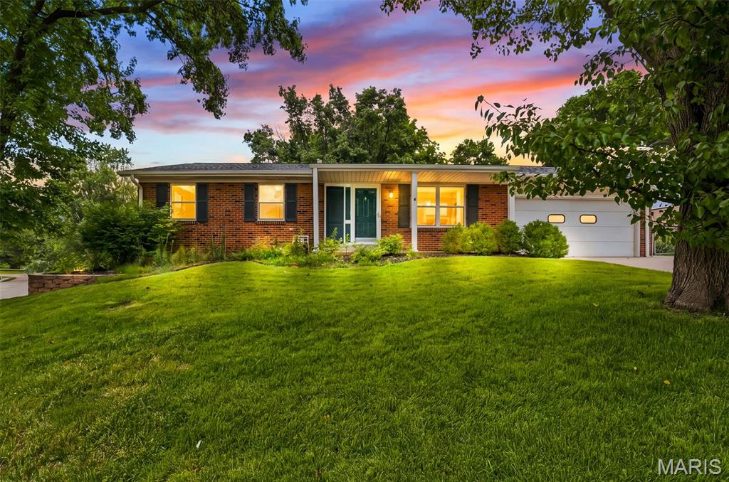 Tucked away among mature trees yet just minutes from shopping, dining, parks, and major highways, this updated ranch offers the perfect blend of privacy and convenience. Step inside to an open floor plan designed for everyday living and effortless entertaining. The spacious living room flows into a stunning kitchen featuring stainless steel appliances, granite countertops, and a breakfast bar that's perfect for gathering with family and friends.
The dining area opens directly to the patio and large fenced backyard, creating an ideal indoor-outdoor living space. The main level offers three bedrooms and two full baths, including a private primary suite. Updated bathrooms and modern finishes add comfort and style throughout.
The finished walkout lower level expands your living space with a versatile recreation area, family room, sleeping room, half bath, and plenty of room for movie nights, game days, a home office, or guests.
Additional features include updated systems, central vacuum, abundant storage, and a backyard oasis surrounded by lush trees that provide shade, beauty, and privacy. Whether you're hosting a barbecue, enjoying a quiet morning coffee on the patio, or simply relaxing at home, this property offers the space, comfort, and setting you've been looking for.