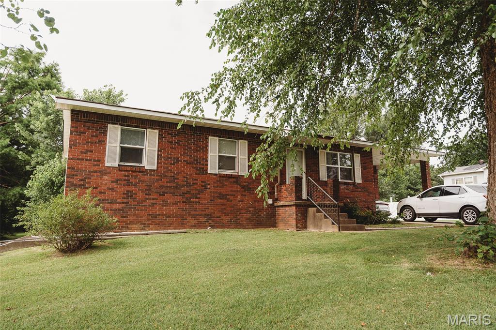 Move-in ready with space to spread out! This 4-bedroom, 2-bath brick home offers updated finishes throughout the main level, including modern flooring, an updated kitchen with stainless steel appliances, and a functional layout for everyday living. The partially finished walkout basement features a fourth bedroom, second bathroom, and an additional bonus room that would make a great home office, playroom, gym, or guest space. Situated on half an acre +/- , this home offers plenty of flexibility, both inside and out.