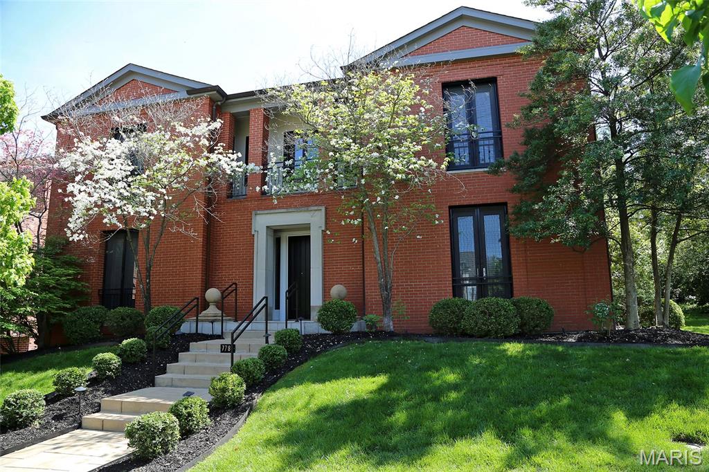 The Jewel behind the door. Old Town Clayton's BEST! 7788 Pershing Avenue draws its inspiration from the Regency Style & incorporates many stellar finishes into the custom floor plan. There are several interior balconies as well as other dramatic architectural features. Located in the heart of Old Town Clayton, built in 1998 by noted Clayton developer, Ed Ellermann, as his personal residence, it has 3 BR, 3 full BA & 1 half BA w/ additional full BA in the finished, walk out LL. An abundance of light enters thru the 2 sty entry foyer, tall windows & 9 sets of French doors. Corner lot, butler's pantry, wet bar w/icemaker, 2 FP, 2 entry foyer closets and 2 sets of washers/dryers. Master BR has pocket doors leading to the sitting room or 3rd BR. Master BA has separate tub & shower. Kitchen features black granite counters & custom cabinets. Asphalt shingle roof, oversized 2 car garage w/ storage room & shared, heated driveway. You won't find it's equal! Dogwoods are glorious in the spring!