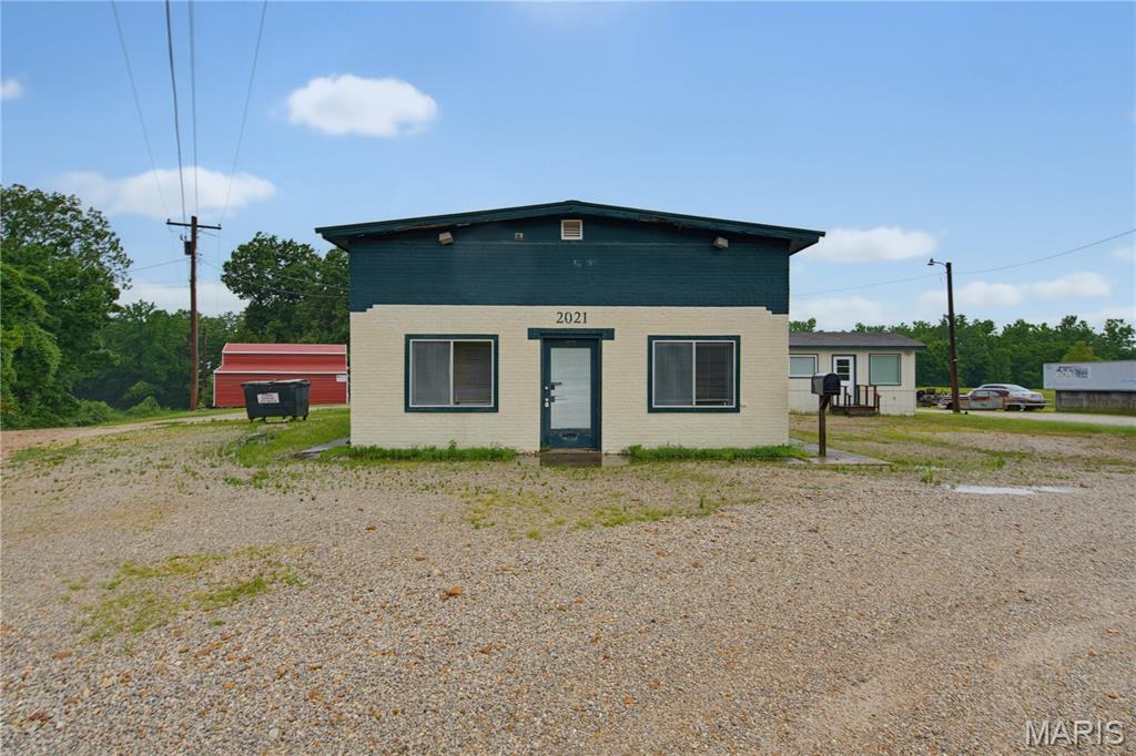 Outstanding commercial opportunity with excellent highway frontage and exceptional visibility, offering maximum exposure for your business. This versatile property features a well-designed main building with a welcoming waiting area, three private office spaces, a half bath, and a spacious two-bay garage that can serve as additional storage or accommodate up to four vehicles.
An added bonus is the separate detached building, providing endless possibilities. Use it as additional office space, a meeting area, or lease it out to generate supplemental rental income. Whether you're looking to establish your own business, expand your operations, or invest in income-producing commercial property, this property offers the flexibility to meet a variety of needs. With its prime location, high traffic count, and multiple-use potential, this is an opportunity you won't want to miss. Schedule your private showing today!