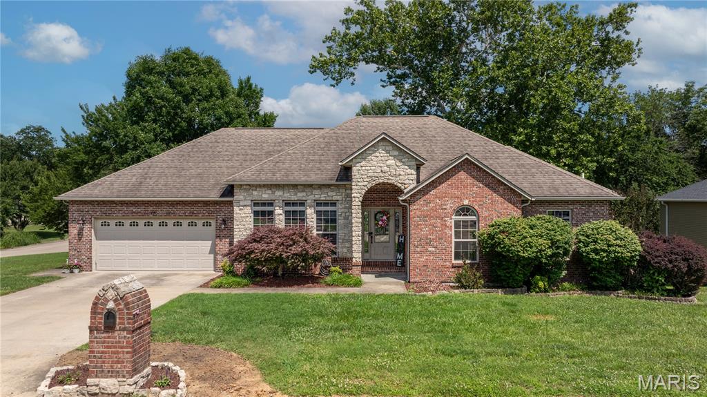 If you’ve been dreaming of a little more space without giving up the convenience of Jackson, this one checks all the boxes.

Situated on a beautiful corner lot just outside the city limits, this stunning home offers 4 bedrooms, 3 full baths, and the kind of layout that was made for gathering. The oversized living and dining rooms provide plenty of room for holidays, game nights, and making memories with the people you love.

From the moment you step through the gorgeous entryway, you’ll notice the timeless brick and stone details that give this home so much character and curb appeal. Step out back and you’ll find a spacious deck that’s ready for summer barbecues, morning coffee, or simply unwinding after a long day.
