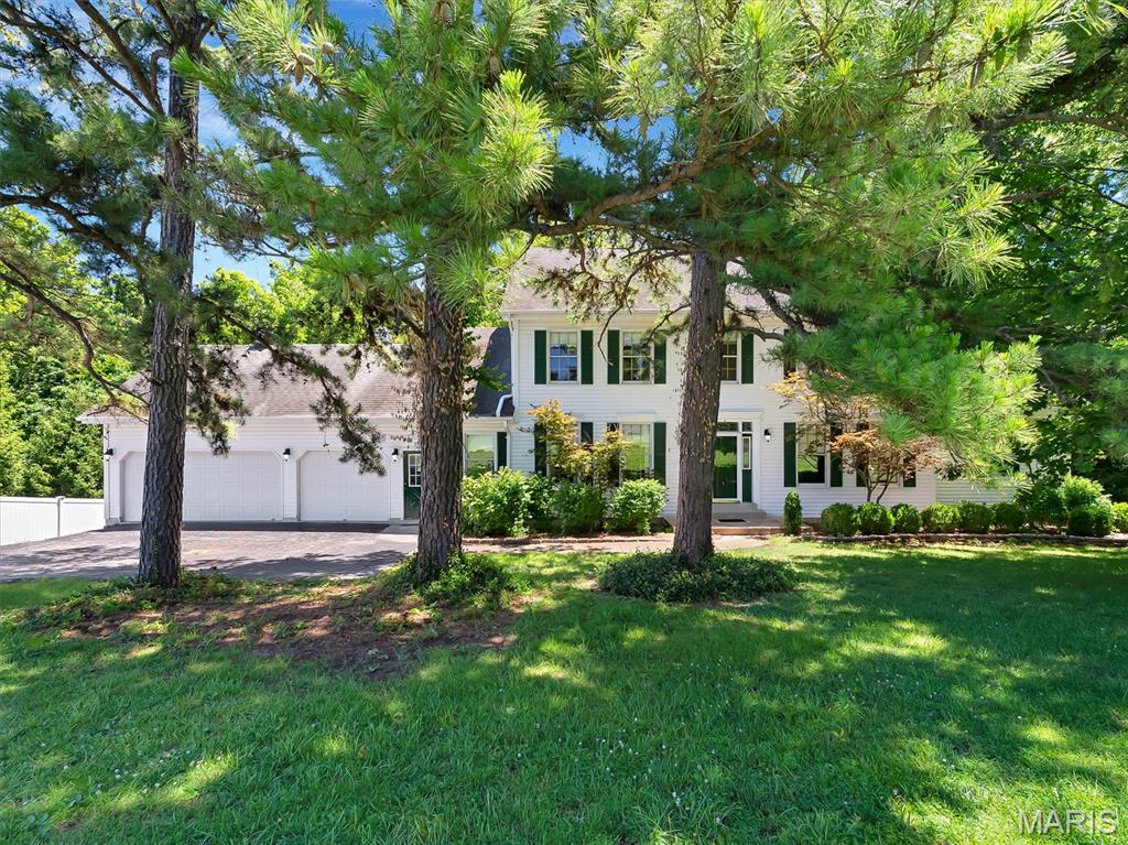 Welcome Home! Sitting on 1.95 private wooded acres in the heart of Des Peres, this 5-bed, 3-bath home offers incredible space, privacy, and the perfect canvas to create your dream retreat. Step inside to find a bright, open main level with a formal dining room, den/office, spacious family room with a wood-burning fireplace, and a large kitchen with breakfast room overlooking the serene grounds. The main-floor primary suite features generous dimensions and an en-suite bath, while four additional bedrooms and a full bath upstairs provide room for everyone. A walk-out lower level with 9+ft pour, egress window, and roughed-in bath offers outstanding potential for future finishing. With an oversized 3-car garage, main-floor laundry/mud room, and a rare estate-sized lot adjoining wooded area, this property is being offered as-is and is ready for a buyer with vision to bring the finishing touches to an already beautiful home.