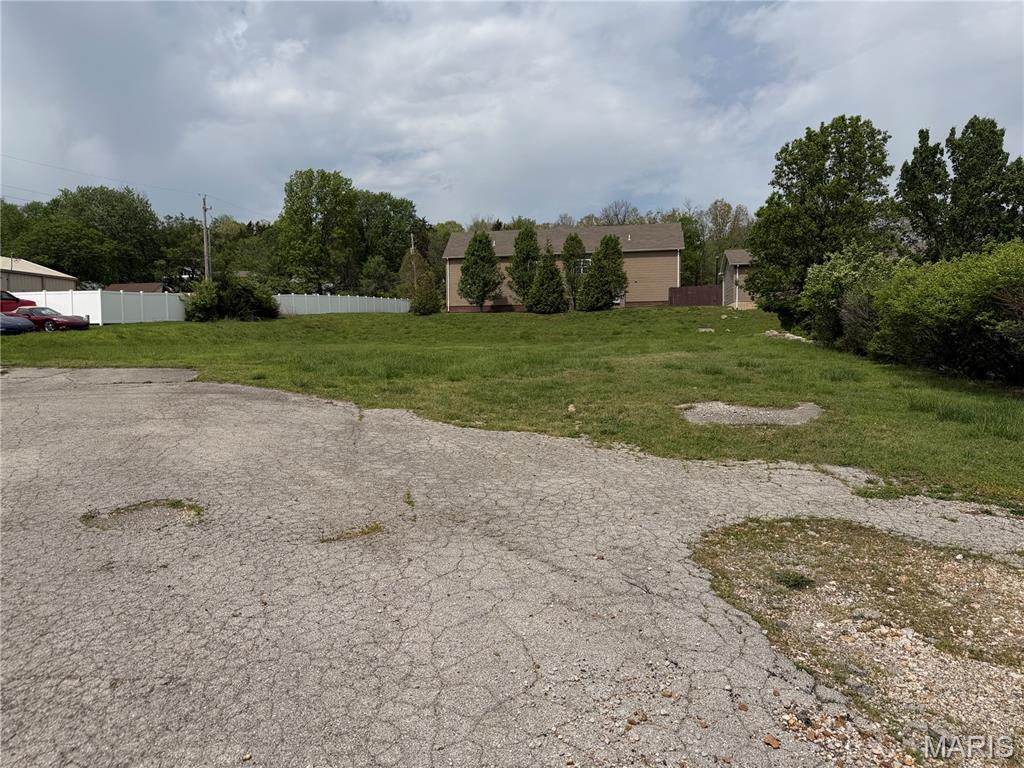 This prime 0.64-acre commercial parcel offers an exceptional opportunity to establish your business in the heart of Eureka, Missouri, with direct visibility and access from the main highway. Positioned in a high-traffic corridor, the property provides outstanding exposure to daily commuters and steady local flow, making it ideal for retail, service, or development ventures. Its manageable size allows for efficient use while still offering flexibility in design and layout. Surrounded by a growing community and established businesses, this site combines convenience, accessibility, and strong market potential—perfect for investors or entrepreneurs looking to capitalize on a strategic, highly visible location.