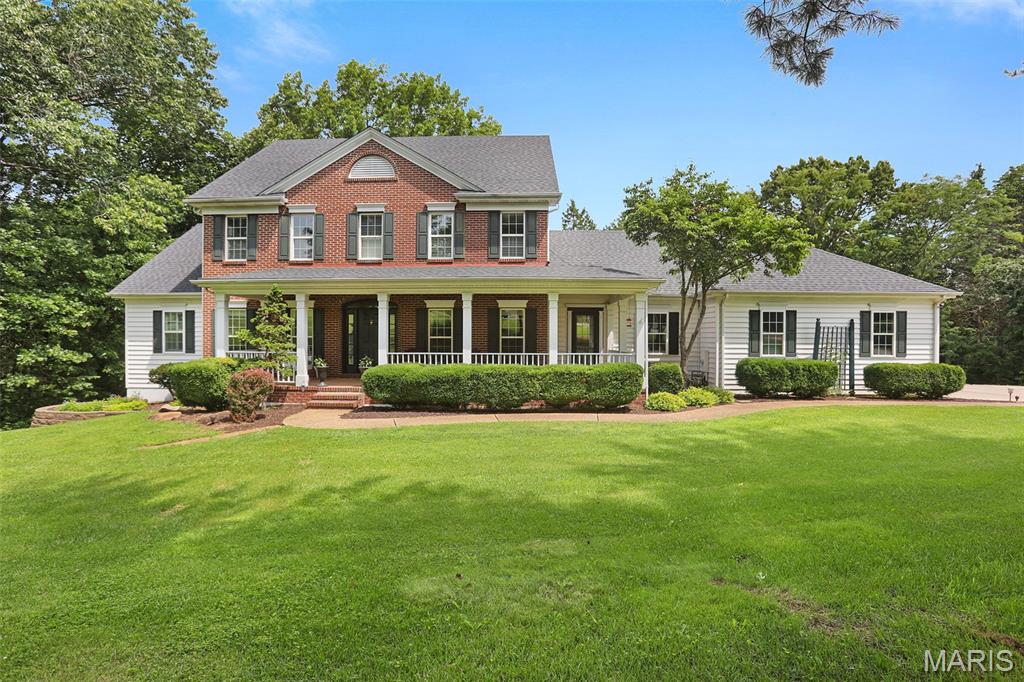 5 Acres! New Roof! Did we get your attention? Let us tell you about 4305 Green Briar Ct. Located just outside of city limits of Washington, MO, this well-appointed custom home has been lovingly taken care of. The custom details will impress you and make your next move so exciting. Tucked away at the back of the cul-de-sac, this impressive 3100+ square foot home offers lots of space in addition to an additional (1000 sqft +/-) finished lower level. The main floor greets you right from the covered front porch into the inviting entry foyer donning inlaid wood floors and massive windows that look out at the back of the home. To the left is the library, to the right is the formal dining room. Step into the great room and experience the expansive tall ceilings, gas fireplace and look above to the open 2nd floor. Custom crown molding is the perfect finishing touch here. Enjoy preparing meals in the kitchen with lots of windows and natural light along with granite and Corian tops, marble and decorative tile, a Thermador 5 burner gas stove top, wall oven, built in microwave and spacious pantry. But wait!!! There is also a butler’s pantry that is perfect for entertaining and more prep and storage space with exterior access to the front porch. The laundry room is oversized and right off the entrance of the 3-car garage. The primary bedroom is on the main floor, again with lots of natural light, walk-in closet and spacious bathroom with separate vanities, separate shower and tub. Upstairs is perfect for guests or a growing family with 2 spacious bedrooms and a playroom or whatever you can imagine. The first bedroom up the stairs also offers a nice walk-in closet and then inside there, a (2nd) cedar-lined walk-in closet! It’s amazing! Both bedrooms share an adjoining bathroom. The finished lower level includes another nice spacious bedroom, family room, office are and loads of storage, even hidden storage. Your agent can inquire. Private 5-acre parcel offers both open ground for the front, side and rear of the home with a wooded tree line to the back and sides with walking trails!