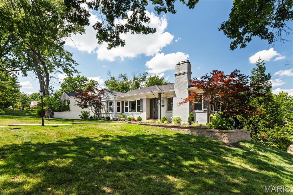 Welcome to 8727 Washington, a beautifully updated ranch home tucked away in a charming University City neighborhood. This inviting three-bedroom, one-and-a-half-bath home offers stylish renovations, an open floor plan, and a layout designed for comfortable living and effortless entertaining. The updated kitchen features granite countertops, maple cabinetry, and ample workspace, opening seamlessly into the main living areas. Gleaming hardwood floors, recessed lighting, and abundant natural light create a warm and welcoming atmosphere throughout.
The spacious main bathroom is a true retreat, complete with double sinks and a seamless glass walk-in shower. Recent updates by the current owners include converting the fireplace to gas, adding a rear patio with extensive landscaping, installing a new front walkway, updating the water heater and HVAC system, and adding fencing for enhanced privacy. Additional features include a convenient tandem tuck-under garage and outdoor spaces perfect for relaxing or hosting family and friends. Ideally located just minutes from Lambert International Airport, Ladue Crossing Station, shopping, dining, and major highways, this home offers both convenience and charm.
Don't miss the opportunity to make 8727 Washington your new home!
Please allow 48 hours for all contract responses.