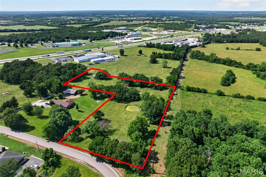 Commercial development opportunity! This 5.35-acre C-1 zoned tract offers the ideal combination of size, accessibility, and flexibility for a wide range of commercial uses. With open ground and a blank canvas ready for development, this property presents an exceptional chance to bring your business, investment, or expansion plans to reality.