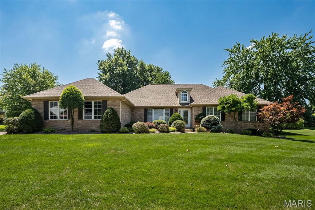 Luxury, comfort, and timeless design come together in this stunning ranch nestled within the sought-after gated community of Whitmoor! Offering over 2,285 square feet on the main level plus a beautifully finished lower level, this exceptional home was designed for both everyday living and effortless entertaining. Soaring vaulted ceilings, skylights, gleaming hardwood floors, and a striking brick fireplace create an inviting great room filled with natural light. The spacious kitchen features granite countertops, abundant cabinetry, center island, two pantries, planning desk, and opens to the breakfast room and cheerful sunroom—perfect for morning coffee or unwinding at the end of the day! The private primary retreat is a true escape with a coffered ceiling, bay window, walk-in closet, and updated spa-inspired bath with dual vanities, separate shower, and soaking jet tub. Two additional bedrooms, formal dining room and main floor laundry complete the main level. Downstairs, you'll discover an expansive finished recreation area with a wet bar, full bath, and endless possibilities for movie nights, game days, hobbies, or hosting guests. Outside, enjoy the peaceful patio overlooking the beautifully landscaped yard with mature trees and irrigation system. NEW ROOF 2026! Whitmoor Country Club Golf community lifestyle with membership access to clubhouse, pool, tennis courts, fitness center and a 36-hole championship golf course - Whitmoor Country Club Membership Required for access. This is the lifestyle you deserve!