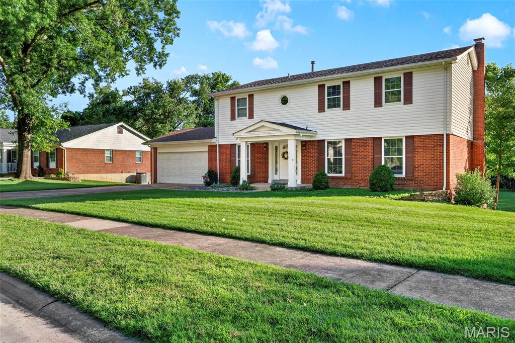 Welcome to this spacious 2-story home situated on over one-half acre in the highly sought-after Forest View subdivision and award-winning Lindbergh School District. Offering 5 bedrooms, 2.5 baths, and a 2-car garage, this longtime family home has been thoughtfully refreshed and is ready for its next owner.

Recent improvements include fresh interior paint throughout the walls, ceilings, doors, and trim, recently installed carpet throughout the upper level, updated light fixtures, basement replacement windows, an upgraded 200-amp electrical panel, roof and chimney flashing improvements, and an updated garage door opener.

The main level features separate living and dining rooms, crown molding, white 6-panel doors and trim, vinyl replacement windows, and a kitchen with 42" oak cabinetry, pull-out drawers, and ample storage. Upstairs, the primary suite offers a walk-in closet and private en suite bath. A secondary bedroom contains washer and dryer hookups concealed behind the wall, providing the option for future second-floor laundry.

The unfinished basement offers excellent storage and future finishing potential. Seller has purchased flood barrier doors for the property that were never installed and will leave them for the buyer if desired. With generous room sizes, solid bones, recent improvements, and the opportunity to add your own personal touches over time, this is a wonderful opportunity in a fantastic South County location.