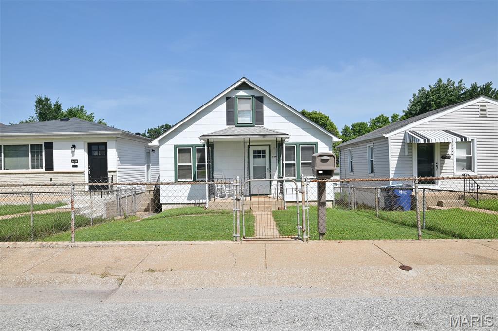 Welcome home to this beautifully updated 2-bedroom, 1-bath gem in the sought-after Bayless School District! Ideally located just blocks from Grants Trail with quick access to I-55, you're only minutes from Downtown St. Louis, Tower Grove Park, Soulard, Lemay Park, restaurants, shopping, and more. Step inside through the brand-new front door and enjoy the fresh look and feel of new laminate flooring throughout the main level. This updated home also features a new back door, a brand-new water heater, and all appliances stay, including the refrigerator, washer, and dryer, making this home truly move-in ready. Start your mornings in the peaceful, enclosed sunroom overlooking the cozy, fenced backyard, or enjoy the additional fenced front yard and covered front porch for even more outdoor space. Parking is a breeze with the oversized 2-car detached garage plus an additional 1-car carport. The walkout lower level provides abundant storage and endless possibilities for a home gym, workshop, or future finished living space, while the upper level offers flexible bonus space and is perfect for a home office, playroom, or guest area. Offering the perfect blend of comfort, convenience, and thoughtful updates, this charming home is ready for its next owner. Schedule your private showing today!
