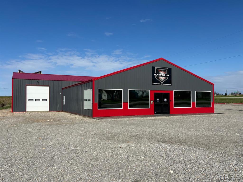 Are you looking for an amazing investment  opportunity?  If so, look no further.  Established in 2024, the Batter-Up Indoor Baseball & Softball Training Facility is located on highly visible Business Highway 61 just off Highway 61 North of New London, Missouri. This location provides quick access to St. Louis, Wentzville, Moscow Mills, Troy, Bowling Green, Hannibal, and Quincy, offering a built-in customer pipeline and excellent growth potential.  Batter-Up Indoor Baseball & Softball Training Facility represents a rare opportunity to acquire a thriving, profitable, automated, and scalable indoor baseball & softball training business with strong recurring revenue and significant untapped growth potential.  This turnkey climate-controlled facility offers year-round training in 6,100 square feet of space.  It includes turf flooring, retractable dividers, 4 spacious retractable batting/pitching cages (70', 55', & 35'), an infield (yard), a gym, a bathroom, a drinking fountain, TVs, surround sound, Batter-Up branded merchandise, and all existing equipment (Hack Attack pitching machines, pitching mounds & mats, balls, rolling practice carts, bands, backstops, protective L screens, and more).  An integrated secure access control system offers members 24/7 access with minimal day-to-day owner involvement, allowing the business to run efficiently without constant owner presence.  Membership provides consistent monthly revenue, while private lessons and cage rentals offer high-margin, on-demand income streams with strong seasonal demand.  Youth, student, adult, family and team memberships are available.  Professional instruction is by appointment only.  The sale includes the building, the business, and all existing top tier equipment.  The business has successfully transitioned out of its startup phase and now generates consistent, strong cash flow with increasing year-over-year profitability.  Confidential financial details are available upon request.  If you are a baseball enthusiast or are just looking for a great business opportunity located in a great area don't snooze and lose.  Opportunities like this don't come around every day.  Schedule your private showing today and see the potential for yourself.  See it, love it, own it TODAY.