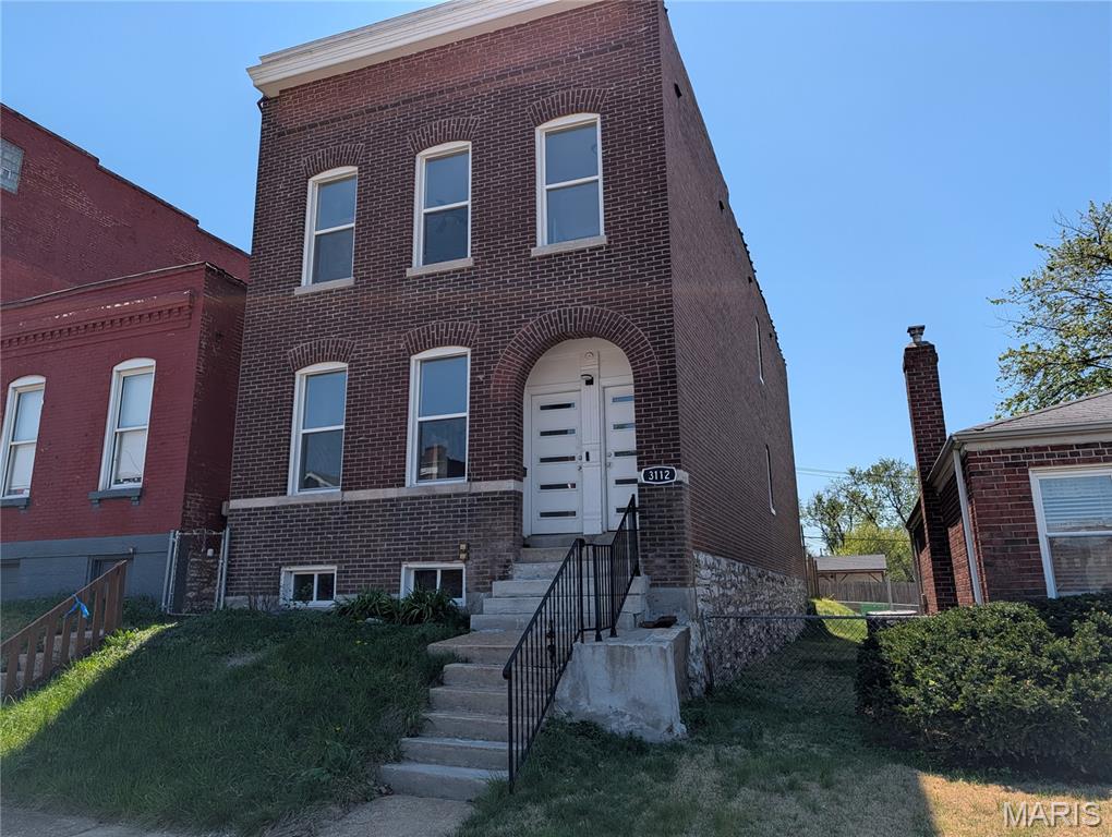 Nicely updated 3 bed, 2 bath home with over 2500sf of living space just mins away from Soulard. Upon entering, you are greeted by a 19th Century staircase & your living room has a decorative fireplace & open concept living room/ dining combo. The luxurious wood plank carries you through the open floor plan into your kitchen with an eat in island, 42" cabinets, farmhouse sink, & quartz countertops. Fall in love with the original built in storage spaces, exposed brick, 10ft ceilings & the simplicity of each bathroom. Upstairs is a bonus room perfect for an office, playroom, or storage. Each bedroom is spacious with charming features including original baseboards & window trim, a pocket door, and/or built in shelving. The primary suite boasts a huge walk-in closet & tons of storage. Outside, the fenced backyard is ready for all your backyard bbqs. Mins away from Soulard Market, Tower Grove Park, Restaurants on Cherokee St & Grand St, & Cherokee Rec Center.
