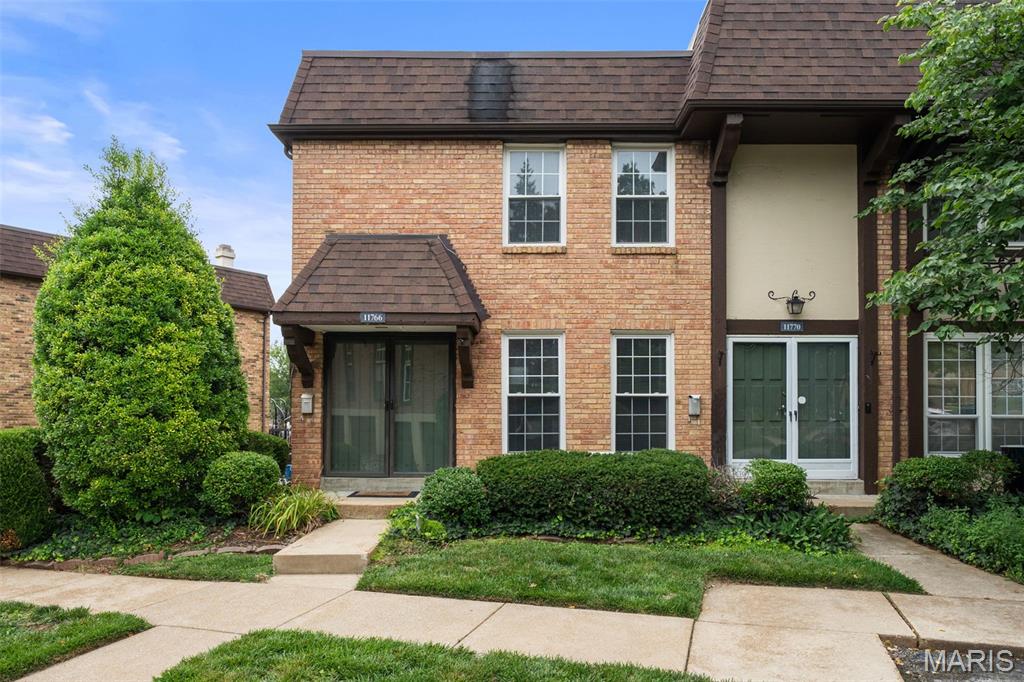 Welcome home to this beautifully updated and desirable end-unit townhouse offering 1,368 square feet of stylish, light-filled living space!  With updated kitchen and baths, this bright, cheery home is move-in ready in time for you to enjoy the community pool! BONUS for this era home, the primary bedroom has a planning desk (or vanity?) PLUS an ensuite bathroom!  2 additional bedrooms share a hall bath and are ready to be utilized for guests, office, or exercise space. Everyone can gather in the stunning kitchen, featuring on-trend finishes, stainless steel appliances, and a walk-in pantry that provides exceptional storage. Updated bathrooms, a new HVAC system, and a new electric panel offer modern comfort and peace of mind, while the coveted 2-car garage with brand-new garage doors is a rare find. Unbeatable proximity to highways and Westport to enjoy the dining, entertainment, and nightlife.  Families will love being served by the award-winning Parkway School District.  Combining modern updates, generous space, an unbeatable location, and low-maintenance living, this exceptional townhouse is one you won't want to miss!  Open Sunday 11-1.