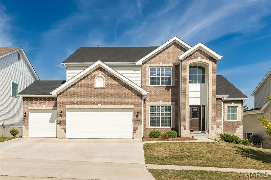 Don’t wait to build… this fabulous 2-year-old home is move-In ready now! An impressive brick & stone elevation highlights the exceptional curb appeal of this McBride-built 1.5 Sty. Covered porch entrance leads to 2-sty foyer, formal dining room and spectacular great room highlighted by dramatic wall of windows. Spacious chef's kitchen with 42'' gray cabinetry, quartz countertops, stainless steel appliances & 7' center island adjoins light-filled breakfast room. Main floor primary bedroom suite with 2 closets & luxury bath offers an appealing retreat. The 2nd floor extends the living quarters with 3 additional bedrooms, 1 with ensuite bath & 2 with Jack n' Jill bath. Lower Level entertainment space includes family room & recreation room with wet bar plus 5th & 6th bedrooms & full bath. Situated on a professionally landscaped lot with patio that spans the rear of the house & oversized 3-car garage. Award-winning Parkway School district.