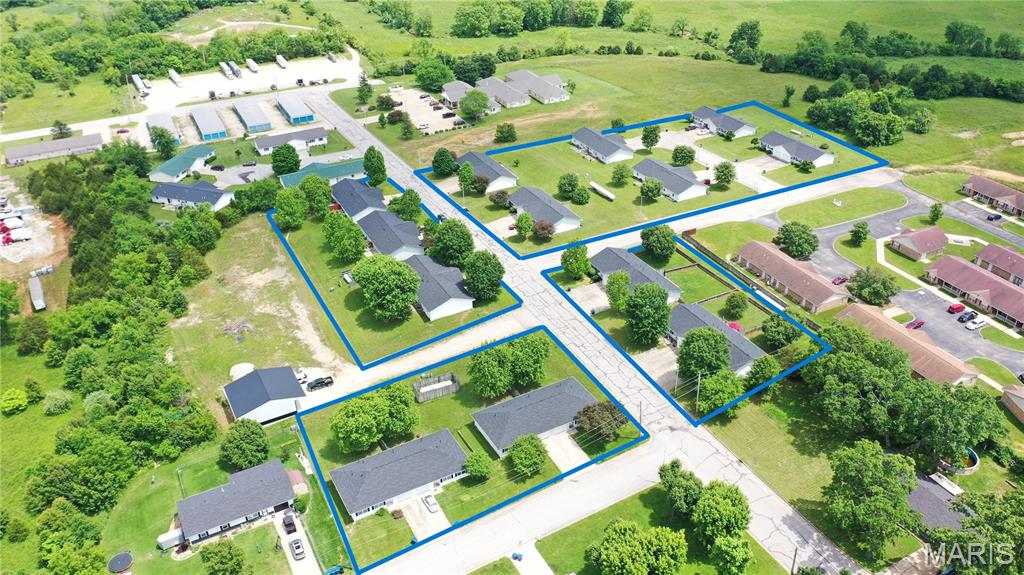 Investor’s Dream: 13 Fully-Occupied Duplexes – 26 Turnkey Rental Units. Seize this rare opportunity to own a portfolio of 13 well-maintained duplexes – totaling 26 rental units – all with new roofs and 100% occupancy.  There’s even a waiting list of tenants, a testament to well maintained property in a location that is highly desired neighborhood.  The properties consist of 22, 2 bedroom, 2 bath units and 4, 2 bedroom, 1 bath units, all have range, fridge, dishwasher, laundry closet, and attached 1 car garage.  One of the duplexes has a full unfinished basement under it.  Propane heat, central air, public water and sewer. Each unit is clean, occupied, and delivering steady cash flow from day one. With a mix of spacious floor plans and modern roofs, maintenance concerns are minimal, and rental turnover is low.  Perfect for investors looking for a turn-key, income-generating property with upside potential. Don’t miss out on this fully-occupied, high-demand investment package. Contact us today to schedule a private showing.  Property also includes duplexes on 1-4 Katie St. and 1402 and 1404 Jennifer Street