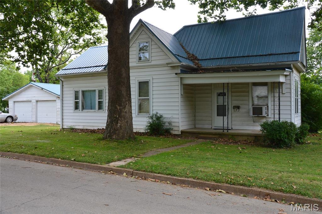 Property sold as-is with no seller repairs.  Older home.  Metal roof and siding. The interior needs updating and repairs.