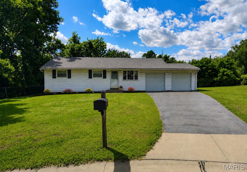 Welcome home to this beautifully updated 3-bedroom, 1-bath ranch tucked away on a spacious cul-de-sac lot in the heart of Maryland Heights! Blending timeless charm with modern updates, this move-in ready home features original hardwood floors that bring warmth and character, complemented by new flooring throughout the remaining living spaces. Fresh paint throughout creates a bright, welcoming atmosphere from the moment you step inside.
The updated kitchen offers stylish finishes and everyday functionality, while the renovated bathroom provides a fresh, modern touch with a soak in tub. A spacious family room addition provides even more room to gather, relax, and entertain, making it the perfect spot for movie nights, game days, or simply unwinding at the end of the day. The finished lower level adds valuable living space that can serve as a recreation room, home office, workout area, or flex space to fit your lifestyle.
Outside, the oversized lot provides plenty of room to entertain, garden, play, or simply relax and enjoy your own backyard retreat. Conveniently located near parks, shopping, dining, schools, and major highways, this home offers the perfect combination of comfort, convenience, and value. All the work has been done—just move in and start living!