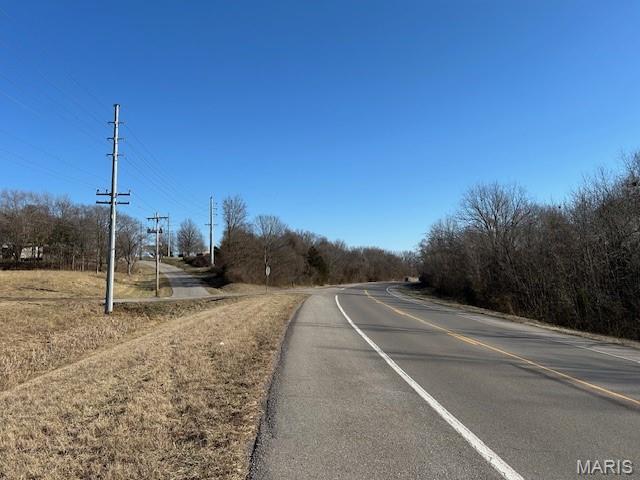 This expansive 26.9-acre prime development property offers high traffic visibility and is zoned for commercial use. The owner is open to dividing the land, providing flexibility for various investment strategies. With city services and utilities readily available, this property is suitable for a wide range of uses.  26.9 acres consists of Parcel #20-200-00-06-003.00-0000 and Parcel #15-819-00-02-001.00-0000.