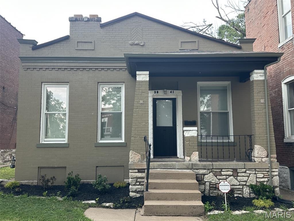Charming All Brick Bungalow in South City! step into timeless character with this all-brick charmer, where classic craftmanship meets everyday comfort. Rich, exposed beamed ceilings add warmth and architectural interest throughout. while the solid brick construction speaks to the quality of a bygone era. Inside, you'll find that unmistakable historic charm-thoughtful details. updated Kitchen, some new appliances, new laminate flooring, and a layout that flows with character you just can't replicate in new construction. It's the kind of home that tells a story the moment you walk through the door. Don't hesitate, This property is a perfect first home or if you are downsizing. parking off alley in rear with a large security fence.