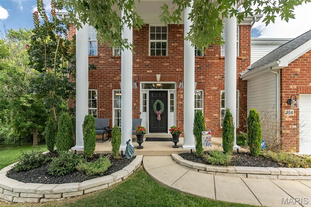 Welcome home to this beautifully updated two-story offering 3 levels of light filled living space, a 3-car garage, and peaceful water views. The impressive foyer welcomes you with a transom window above the entry and engineered wood flooring that extends throughout the main level. Formal living and dining rooms lead to the spacious family room featuring a marble-surround gas fireplace and a dramatic five-panel bay window. The beautifully updated kitchen is designed for gathering, showcasing stainless steel appliances, a gas range, subway tile backsplash, corner sink, L-shaped island, and adjoining breakfast area. Just beyond, the vaulted sunroom is filled with natural light from its elegant clerestory accent windows and offers a ceiling fan and beautiful views of the backyard and neighborhood pond. Step outside to the wood deck overlooking the tranquil setting below. The main-floor laundry room includes a utility sink for added convenience. A turned two-story staircase accented by a stunning Palladian window leads to the upper level, where the vaulted primary suite features a ceiling fan and spacious walk-in closet. The luxurious primary bath offers a freestanding soaking tub, walk-in glass shower, ceramic tile flooring, and a double-bowl vanity with center knee space. Three generously sized secondary bedrooms complete the upper level, including two connected by a Jack-and-Jill bath, while the third enjoys the privacy of its own en suite bath. The finished walkout lower level provides exceptional additional living space with a recreation room, game room, office that could double as a sleep space, AND a fifth bedroom, abundant storage, and walks out to a beautiful aggregate patio with decorative brick trim. Thoughtfully updated throughout and ideally located in the highly sought-after Parkway South School District, this exceptional home offers a peaceful setting on a quiet little cul de sac.