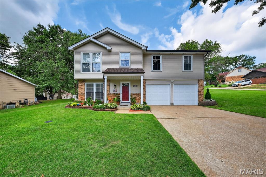 Tucked on a spacious corner lot just minutes from Bee Tree Park, this extremely well-maintained raised ranch offers the perfect combination of everyday comfort, functional space, and thoughtful updates. Inside, you’ll find a bright open floor plan with updated flooring, and an inviting layout designed for easy living and entertaining. The remodeled kitchen features custom 42" cabinetry, newer appliances, and custom tiled backsplash and opens directly to the dining area with access to a large 20x12 composite deck, overlooking the manicured backyard, enclosed by a custom, white aluminum fence.

The cozy family room is highlighted by a charming wood-burning fireplace with white-wash brick hearth, creating the perfect gathering space year-round. This 3 bedroom, 1.5 bath home also includes an oversized two-car garage complete with shelving, cabinets, workbench space, and additional storage. Major updates  include vinyl siding, architectural roof, fascia and gutters (Just like everyone else in Oakville last year!), composite deck, bathrooms, lighting, flooring, appliances, and THAT YARD! With its excellent curb appeal, mature landscaping, and a large level yard, this home is move-in ready and offers outstanding value in a great Oakville location.