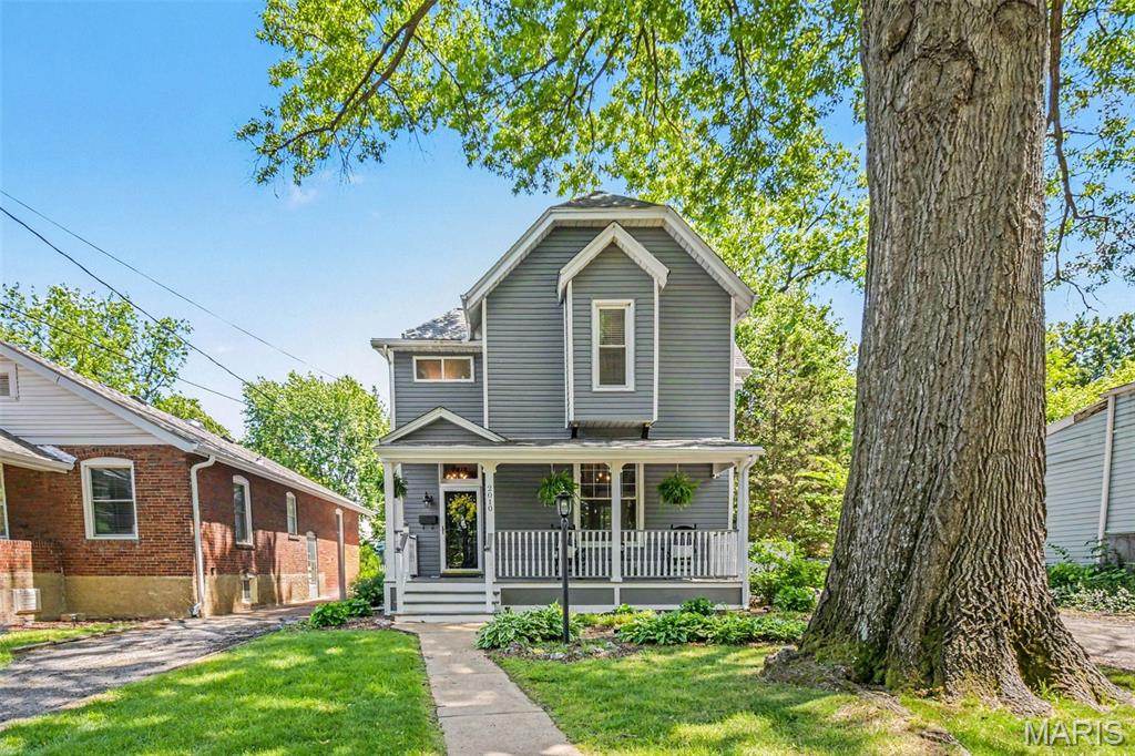 OPEN HOUSE 1-3 PM 7/05/2026. Don't miss an opportunity to live in this handsome 19th century gem with tons of quality updates, in one of St. Louis’s most desirable neighborhoods right at the edge of the city bordering Richmond Heights & Maplewood. Expansive covered front porch & level fenced lot makes for plenty of room to entertain. The interior features three bedrooms & one and a half baths. Hardwood flooring in the living & dining rooms with fireplaces in both. Porcelain tile in the beautifully remodeled kitchen that walks out to a family room addition off the back of the house. Bedrooms are carpeted & spacious. Both baths are updated with porcelain floors & attractive fixtures. A huge stamped concrete patio in the back yard is prime for summer parties or just relaxing & an over-sized one-car detached garage for secure parking. Just a quick drive to local universities & hospitals for professionals or students. Mere minutes from Forest Park, lots of local eateries, & shops make this a great place to make your home.