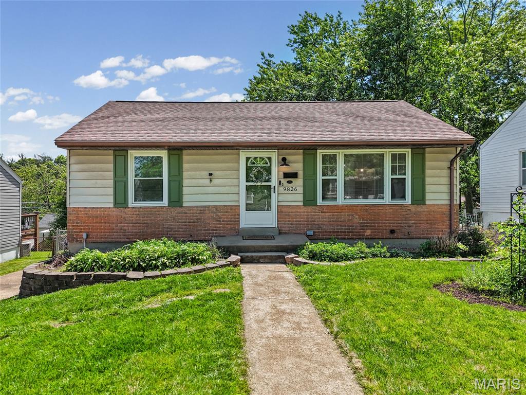 WOW - Outstanding opportunity!! Great curb appeal leads you to the inside of this gorgeous home with awesome updates (roof 2025, newer water heater, brand new electric panel+++). Lots of natural sunlight through the big front window & beautiful hardwood flooring as you enter the spacious living area. The big eat-in kitchen offers a large pantry, solid countertops, ample amount of cabinetry and stainless steel appliances. There are two great sized bedrooms on the main level and an updated bathroom. Downstairs there’s a fully usable lower level with a large recreation/ family room that's already finished - could be another sleeping room, office, gym/ workout space+++ Additionally, there's a bonus room that could be finished! Separate utility/ laundry room for extra storage. A large deck off the kitchen overlooks your fully fenced in yard. You'll love this backyard oasis with a firepit setup AND a shed. Move-In Ready for you - comes with a passed occupancy AND a home warranty! Location, location - great walkability to shops, restaurants & parks. Easy access to 170, St Louis City, STL airport and all major highways. CALL NOW