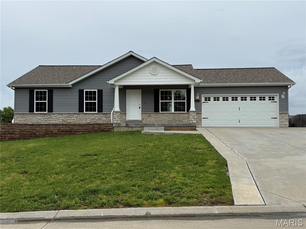 Beautiful 3-bedroom, 2-bath home! This well-maintained home features durable wood-look luxury vinyl flooring, new carpeting, fresh interior paint throughout, and a bright, open living space with vaulted ceilings. The kitchen includes bold white cabinetry, center island, stainless steel appliances, marble-look countertops, and a stylish backsplash. Neutral colors throughout make it easy to add your personal touch. The backyard is fully fenced along with an extended patio and an above ground pool. The oversized custom driveway offers plenty of additional parking. This move-in-ready home offers modern style in one great package!