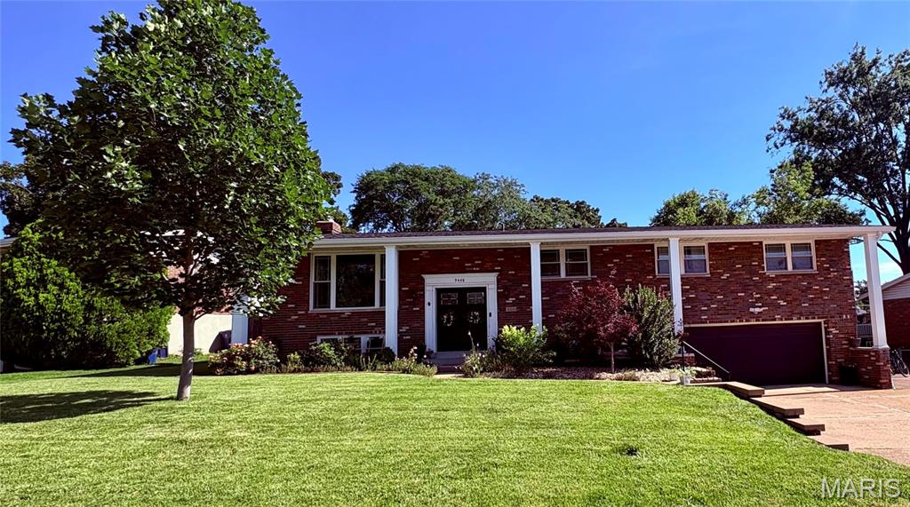 This beautifully maintained, move-in ready, split-level home offers plenty of space for comfortable living. The main level features a bright living room, formal dining room, newly remodeled kitchen, five bedrooms, three full bathrooms, and a cozy sitting room/den. The main bedroom offers an extra room for an office space, dressing room or nursery. The finished lower level provides additional living space with a large family room, fireplace, bar, large laundry room, an extra bedroom, and a full bathroom—perfect for guests, extended family, or a private retreat. With great curb appeal, a new roof, and an excellent location in a desirable neighborhood, in the Lindbergh School District, this home combines style, space, and convenience. An exceptional opportunity to own a truly wonderful home!