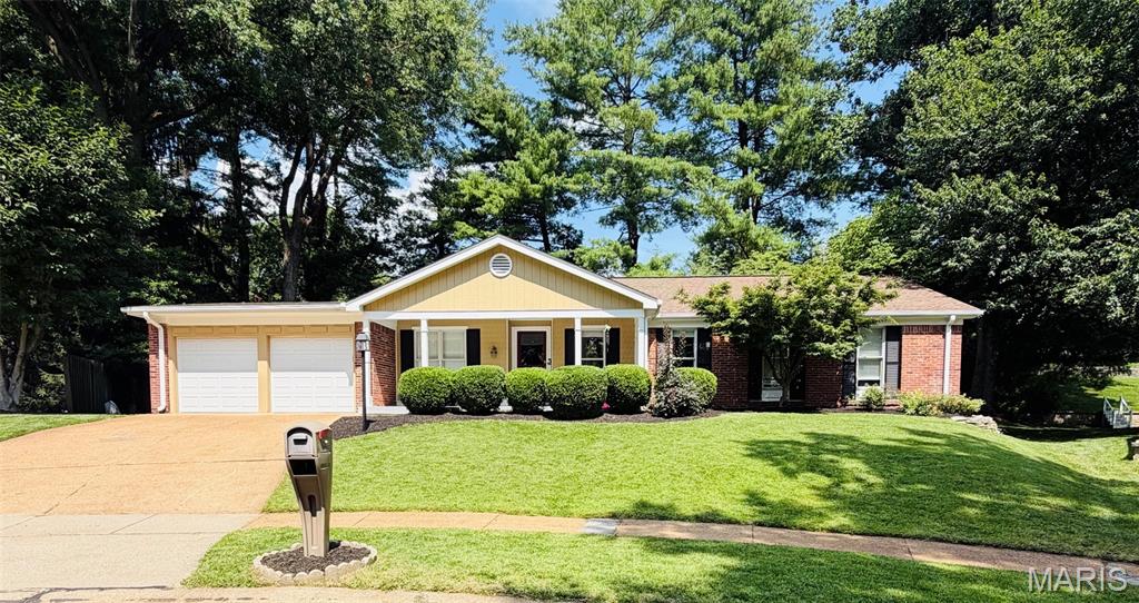 Welcome home to this beautifully updated ranch in the highly desirable Old Farm neighborhood, offering approximately 3,000 square feet of thoughtfully designed living space. A welcoming foyer opens to a light-filled, open-concept floor plan enhanced by gleaming refinished hardwood floors and fresh neutral décor throughout.The stunning kitchen has been completely updated with 42-inch white shaker cabinetry, granite countertops, a designer tile backsplash, and a full suite of stainless steel appliances. Both bathrooms have been tastefully renovated with stylish tile, new vanities, contemporary fixtures, and elegant finishes.
The inviting family room features a cozy fireplace, custom built-in bookshelves, and peaceful wooded views, with direct access to the expansive patio—perfect for relaxing or entertaining. Additional updates include new interior doors, modern lighting, and stylish finishes throughout the main level.The finished lower level offers exceptional additional living space, complete with new carpeting, a spacious family and recreation area, a dedicated workshop, and a pool table that stays with the home. Enjoy the outstanding amenities of Old Farm, including the neighborhood pool just a short stroll away. Located in the award-winning Parkway School District, this exceptional home offers convenient access to major highways and is just minutes from shopping, dining, parks, schools, and the outdoor recreation at Creve Coeur Lake.