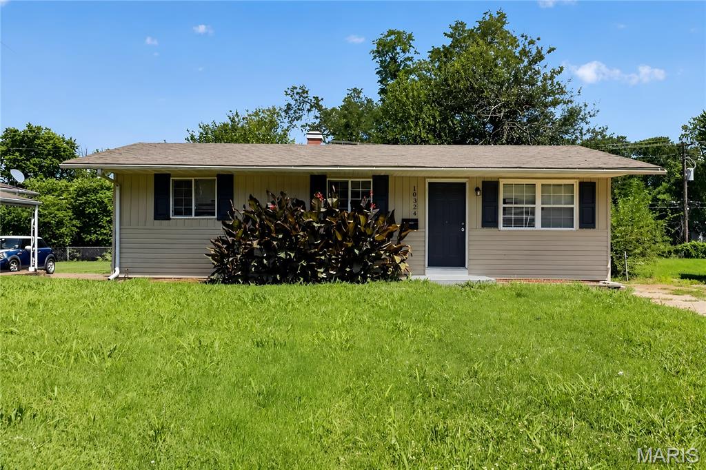 Welcome to this charming 3-bedroom, 1-bath ranch offering 932 square feet of comfortable living space. Situated on a spacious lot, this home features a functional layout with generously sized bedrooms, a bright living area, and a full basement that provides excellent storage or future finishing possibilities. The detached garage adds convenience for parking and additional workspace. Enjoy the backyard with plenty of room for outdoor activities, gardening, or entertaining. Conveniently located near schools, parks, shopping, and major roadways, this property offers easy access to everyday amenities.
