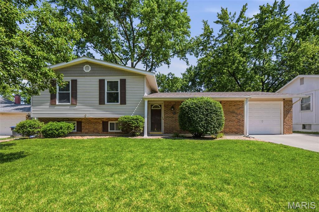 OPEN HOUSE MAY 31 CANCELLED.
Amazing home in heart of St. Peters. Updates include main level luxury vinyl plank flooring, lighting, kitchen with granite counters & stainless appliances, all 3 baths with beautiful tile work in shower & tub & comfort height vanities. A few steps up to 3 spacious bedrooms including primary with ensuite bath & large double closet along with updated guest bath. Head to finished lower level with rec area for great home office, rec room, play room or bar area & a third updated bath. Step outdoors through sliding door in breakfast area to spacious deck with stairs to patio & level fenced yard great for entertaining. Oversized 1 car garage with double wide driveway. New electric panel 2026. Seller leaving LL mini fridge & offering buyer a 1 year home warranty plan.