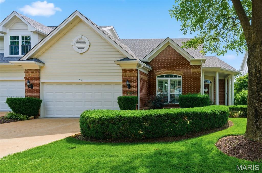 Beautifully maintained atrium ranch villa in desirable Baxter Pointe Villas! This spacious home features soaring 11-foot ceilings, hardwood floors, and an open floor plan filled with natural light from dramatic floor-to-ceiling windows. The living room opens to a private deck, while the kitchen offers a center island, built-in oven and microwave, planning desk, and abundant cabinetry.

The main-floor primary suite includes a bay window, walk-in closet, and luxury bath with double vanities, soaking tub, and separate shower. The finished lower level features a large family room with gas fireplace, wet bar, second suite with full bath, and a versatile bonus room perfect for an office, gym, or hobby space.

New roof in 2025. Conveniently located near shopping, dining, and major highways, this exceptional villa offers the perfect blend of comfort, style, and low-maintenance living.