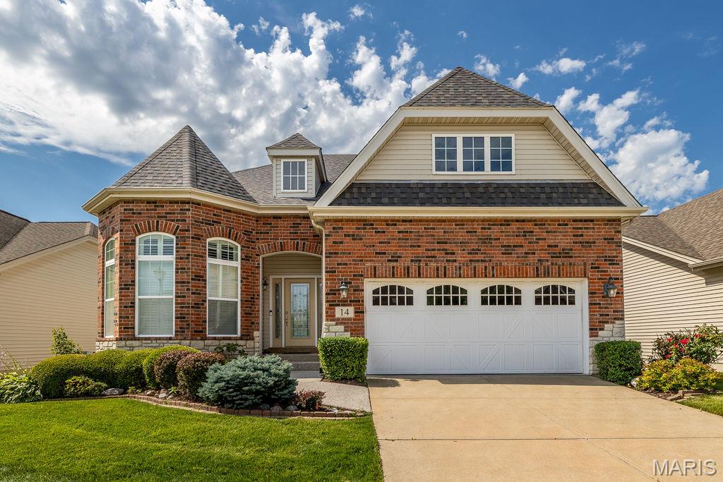 Absolutely stunning ranch with brick & stone front & beautiful landscaping. High hip roof line for the extra high ceilings inside. Enter the large hardwood entry foyer. Large dining room on the left w/12ft ceilings with big 3 window bay. Kitchen offers 10ft ceilings, beautiful maple cabinets, dbl oven, stainless steel appliances, granite counters, breakfast bar & large pantry. Nice roomy breakfast room area. Huge family room w/12 ft ceilings, crown molding, gas fireplace & door that leads to your huge 15X11 screened in , covered composite deck w/12ft ceiling & awesome view of trees and pond. Huge primary suite w/ 3 window bay, coffered ceiling, 2 walk in closets, luxury bath with dbl vanity & make up area, large corner, jetted tub, large walk in marble shower. Second bedroom with large hall full bath. Main floor laundry room with cabinets & shelving. Wide staircase leads to finished lower-level w/9ft pour with lots of room in the family room w/gas fireplace & game room with nice wet bar w/cabinets 7 bar stool seating. Walks out to large, covered patio. 3rd full bath with large walk-in shower. 3rd large bedroom with 2 full size windows & walk in closet. Still offers plenty of storage or workshop area in unfinished area.  Oversized 2 car garage is 22ft deep & 20ft wide. All this & Roof was replaced in 2025, HVAC replaced in 2022, Hot water heater 2022. Plus your yard maintenance and snow removal, sprinkler system is taken care of. Roof replaced 11 of 2025. HVAC replaced 07-2022, Hot water heater replaced 09-2022. Make your appointment today!!